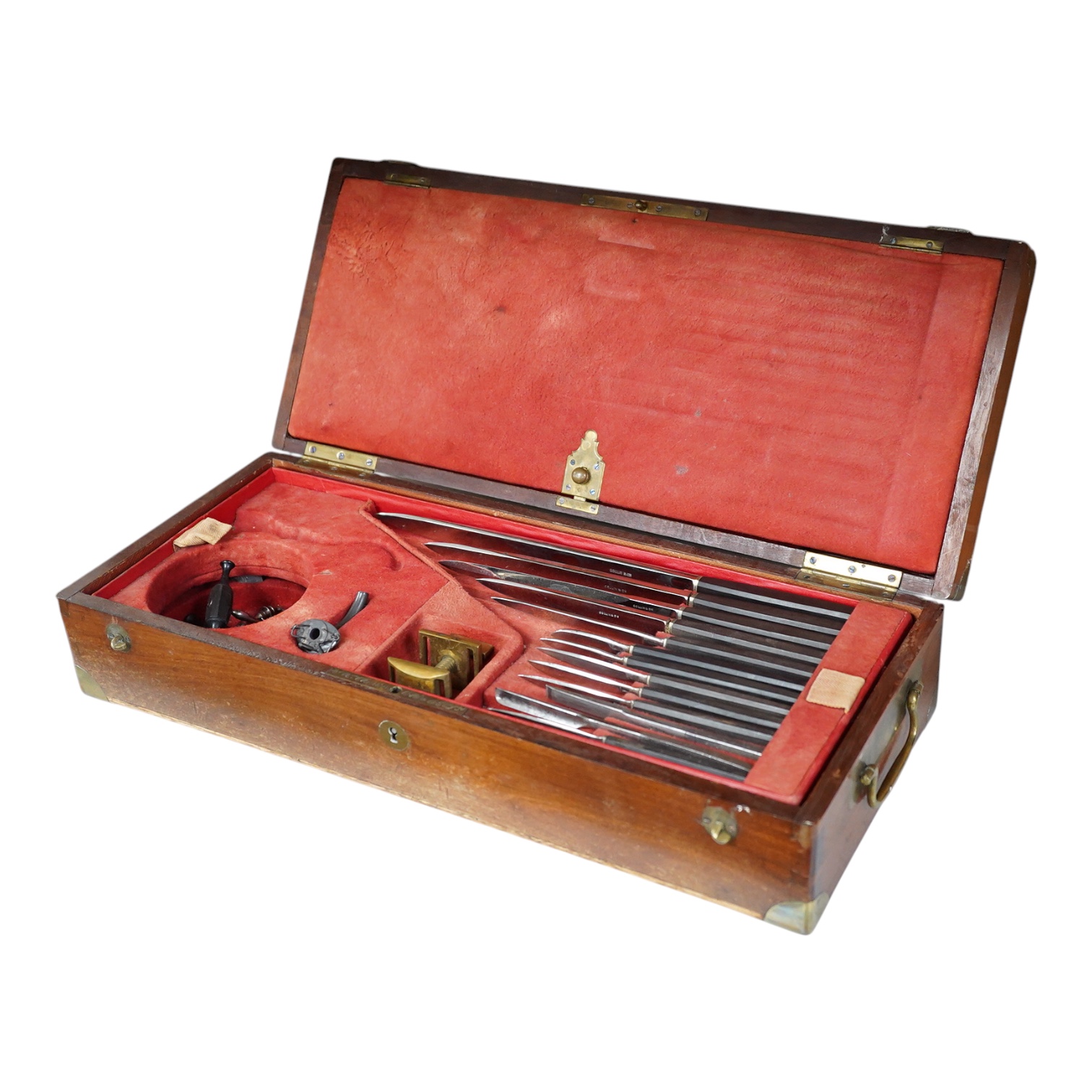 A 19th century surgeon’s set by Collin & Cil., Paris, in a fitted mahogany case, comprising of steel surgeons instruments; knives, scalpels, scoops, tourniquet, saws, rasps, some instruments stamped with maker’s name, wi